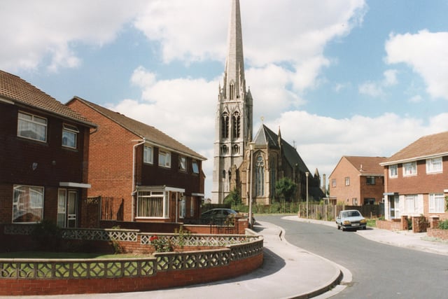 Sitting in the considerable shadow of St Walburge's Church spire is the street named after the church - St Walburge Avenue, Preston - pictured here in 1990