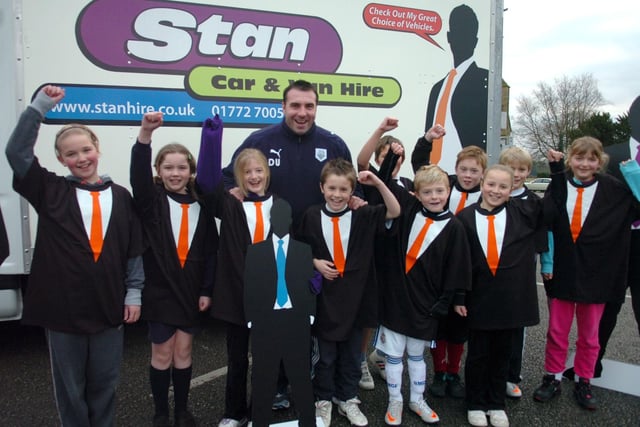 Preston North End first team coach David Unsworth with some of the children of Alston Lane Primary School, near Longridge, taking part in a footballing event