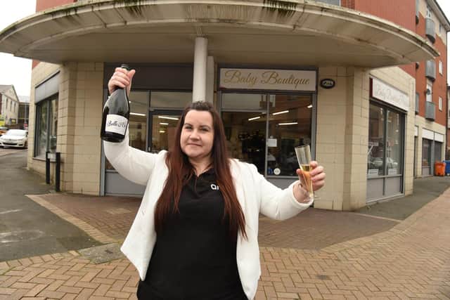 Sarah Marsh has reopened Baby Boutique following a flood that destroyed the shop