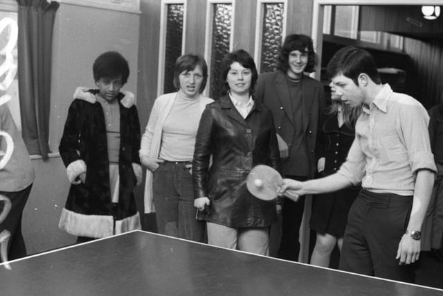 Fr Peter Foulkes has a very large "family". For he is responsible for the St Augustine's Youth Club with a membership of 250 teenagers - with ages ranging from 11 to 15 years old. Members of the youth club have a variety of activities arranged each week. Pictured above, Bill Bonass, 17, of Tiber Street, Preston, shows his skill at table tennis