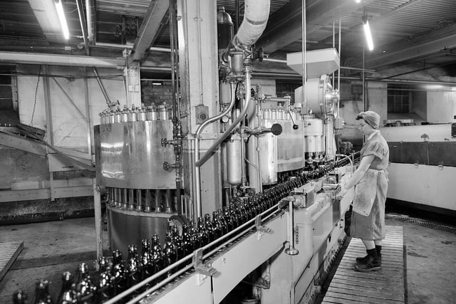 Bottling beer at the McEwans Brewery, in Fountainbridge, in April 1960.