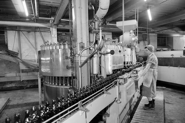 Bottling beer at the McEwans Brewery, in Fountainbridge, in April 1960.