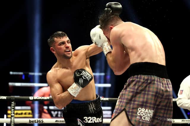 Jack Catterall (left) in action against Josh Taylor in the junior welterweight bout at the OVO Hydro, Glasgow, in February