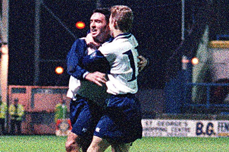Lee Ashcroft celebrates his hat trick vs Fulham with Lee Cartwright