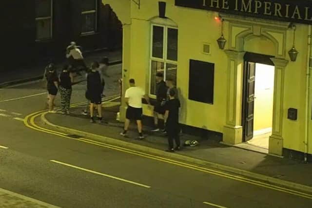 CCTV captures a man and woman brawling on Fellery Street, alongside The Imperial pub, on 1st September - both of them later re-enter the premises (footage shown during Chorley Council licensing committee hearing)