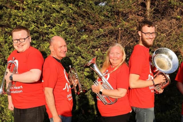 Leyland Band members try out their BHF t-shirts