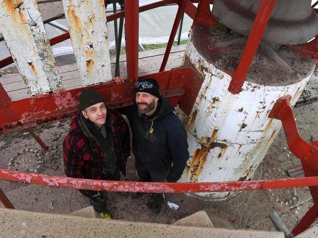 Michael Ainsworth and Ian Blakely of Sandblasting Lancashire, begin the refurbishment of the iconic buoy on Preston Docks