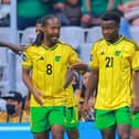 Daniel Johnson (left) alongside teammates after Bobby Decordova-Reid's opening goal