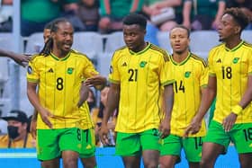 Daniel Johnson (left) alongside teammates after Bobby Decordova-Reid's opening goal