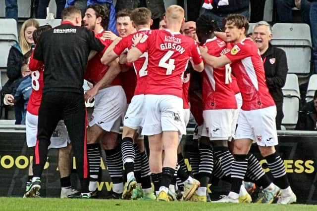 Morecambe celebrate their winning goal against Lincoln City last weekend Picture: Michael Williamson