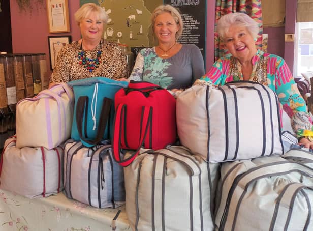 Kay Johnson (centre) pictured with Paula Gamester and Maureen Fazal from The Sewing Rooms at the thermal bag launch event at The Larder