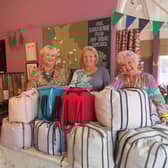 Kay Johnson (centre) pictured with Paula Gamester and Maureen Fazal from The Sewing Rooms at the thermal bag launch event at The Larder