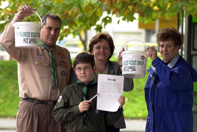 Scout leader Jack McGrath with scout Jonathan McCormack, Coun. Rowena Edmondson and Marie Milne at the 6th Fulwood scout troop Save Our Hut appeal at Booths in Fulwood, Preston back in the year 2000