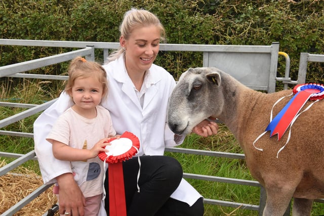 Felicity Mason and her daughter Mia, two with their winning Blue Faced Leicester