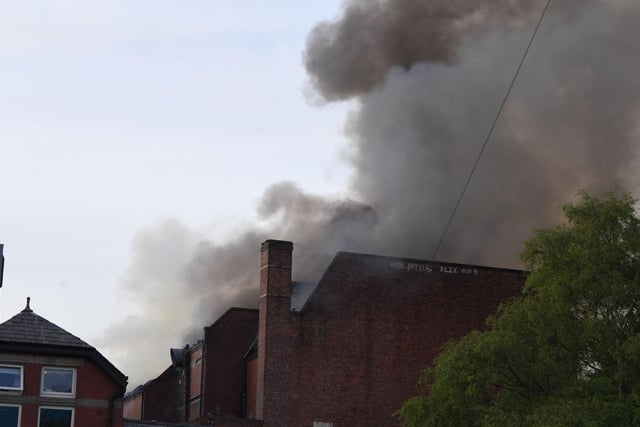 The latest scenes are firefighters battle the blaze.