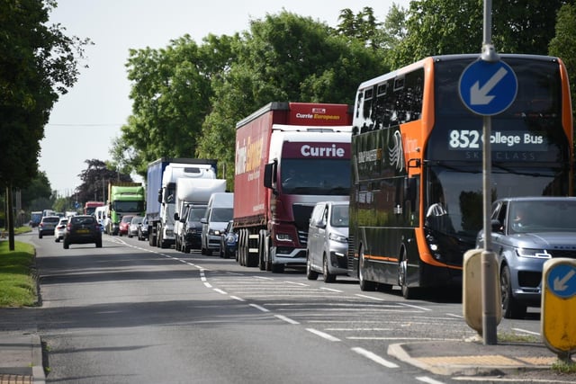 The crash has led to long queues on the A6 Garstang Road in Barton as traffic is diverted from the motorway