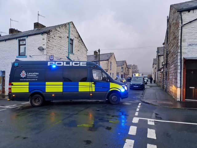 These were the scenes in Burnley's Stoneyholme earlier today after a suspected explosive device was discovered in an outdoor community hub area