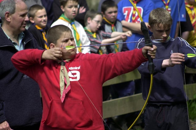 Michael Denoual, of 1st Broughton Scouts, enjoyed his birthday trying some archery at the scouts County Rally held at Waddecar Scout Camp, Beacon Fell in 2003