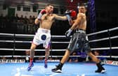 Isaac Lowe, left, in action against Luis Alberto Lopez