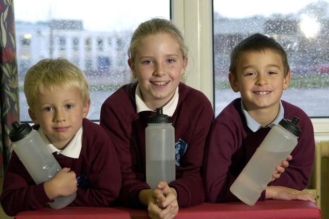 Penwortham Primary School pupils, from left, Anthony Miller, five, Sophie Yates, 10, and Simon Dunstan, eight, with water bottles they are allowed to use in class