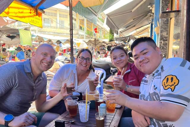 Enjoying a coffee stop with AN Tours on the 'Saigon Unseen' private tour. Image: AN Tours