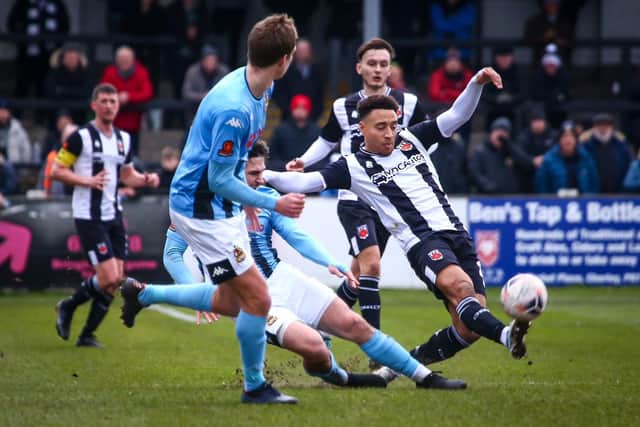 Chorley's Adam Henley plays the ball forward against Southport on Saturday (photo: Stefan Willoughby)