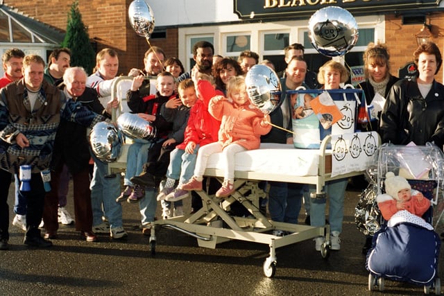 Regulars of the Black Bull, Fulwood, prepare to set off on a sponsored bed push in aid of the Great Ormond Street Appeal