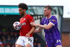 Derek Adams hopes to call upon Lee Angol's services Picture: Morecambe FC