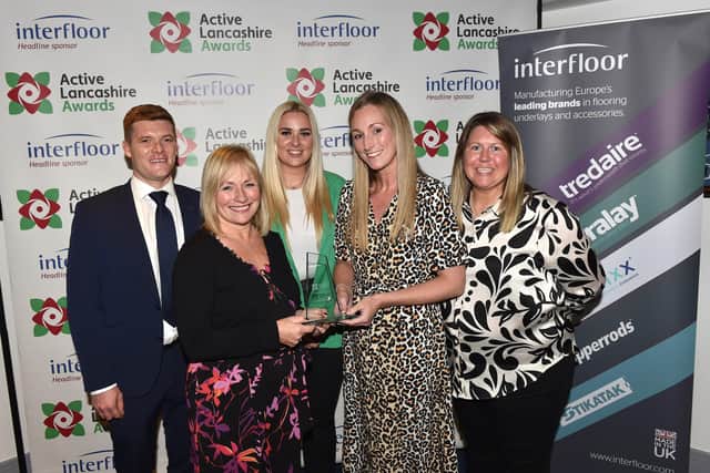 The winners of the Active Lancashire Awards were announced last week. Pictured: Christ the King staff recieve their trophy from Active Lancashire board member Lynne Horner.