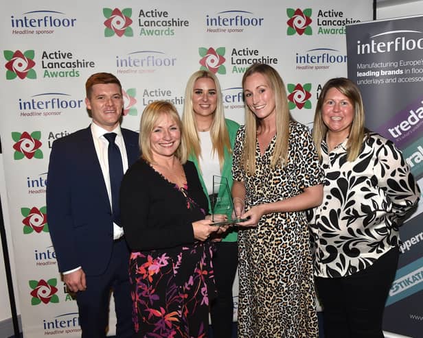 The winners of the Active Lancashire Awards were announced last week. Pictured: Christ the King staff recieve their trophy from Active Lancashire board member Lynne Horner.