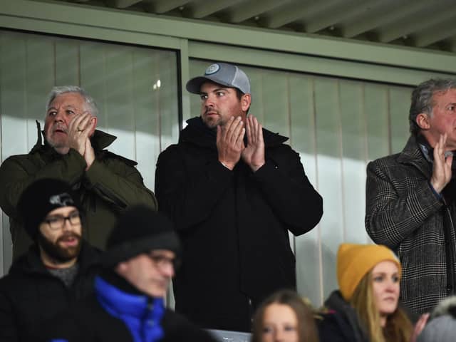Chris Kirchner with agent Paul Stretford (left) and former Manchester City chief executive Garry Cook (right). Pic: Getty Images