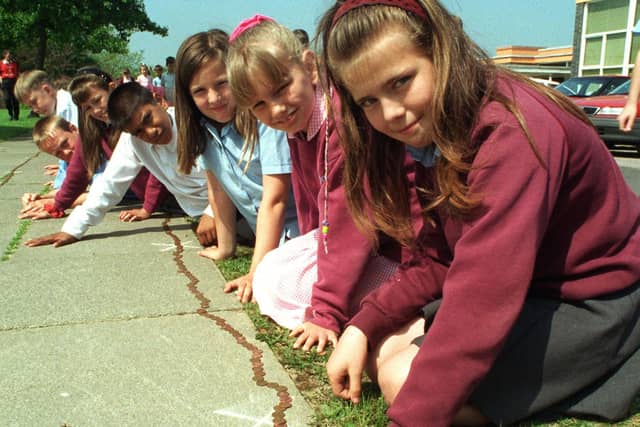 Pupils from Preston's Savick County Primary School make a mile of pennies during their maths week. The money will go towards North Lancashire Blind Welfare Association