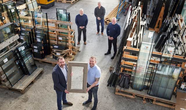 Nationwide Frame Services has secured £1m to fud growth. Pictured are: (left) Mike Calvert from Reward Finance Group with Paul King (right) and behind Mike Hickman (Practical Business Solutions), Shaun Wane (Wane Group) and John King (NFS)