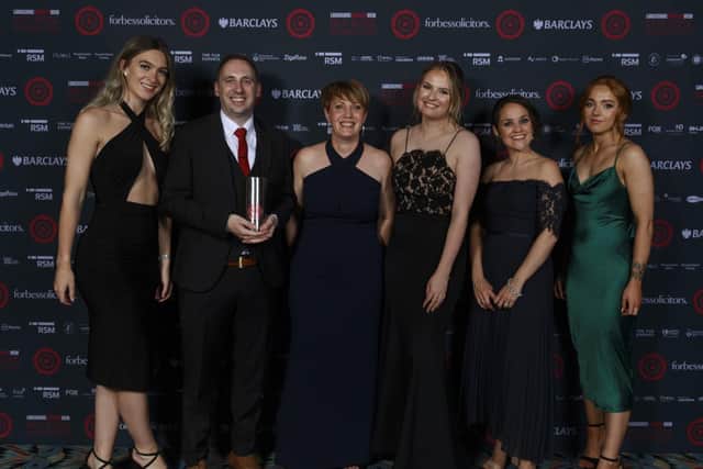 Two Stories has won the Design Award at a Lancashire-wide business awards. From left:  Lara Whiteside, Rob Ellis, Joanne Hindley from award sponsor Peter Scott Printers, Bekkie Hull, Stacey Waugh and Lauren Rankine.