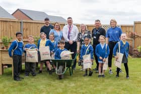 Sudell Primary School staff and pupils with Taylor Wimpey and Playsmart UK