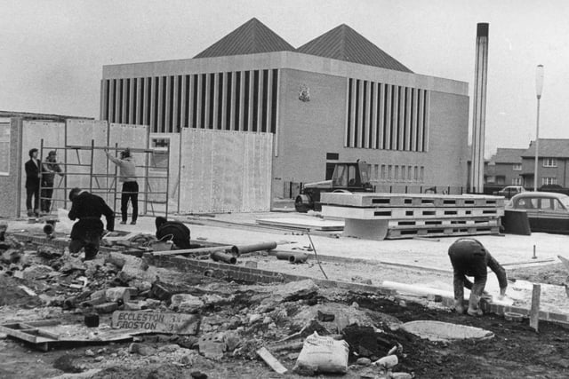 This image was taken in 1969 and shows work proceeding on the new council offices in Lancastergate, Leyland. Behind the construction is the recently completed court house. You can also see a signpost for Eccleston and Croston in the rubble at the front