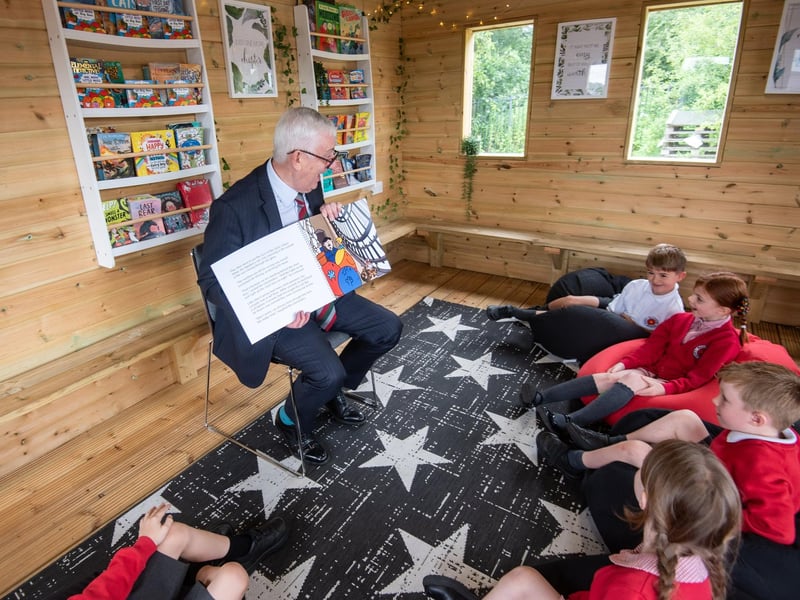 A special storyteller keeps pupils at Balshaw Lane Community Primary School entertained