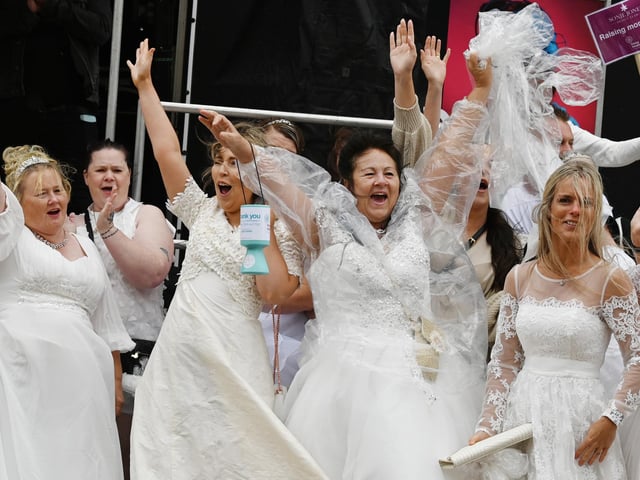The annual Wedding Walk, raising funds for Trinity Hospice.