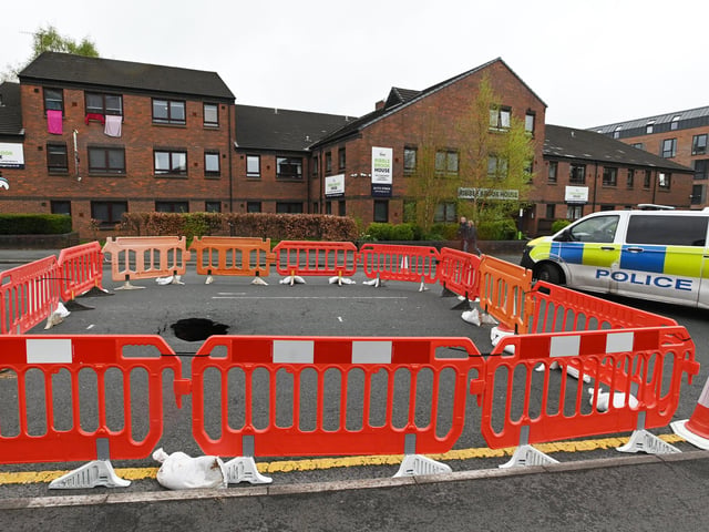 Police at the sinkhole on Moor Lane, Preston.