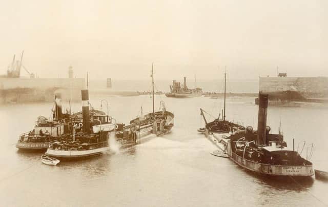 Dredgers opening the mouth of Heysham Harbour, 1904. Photo courtesy of Heysham Port Ltd.