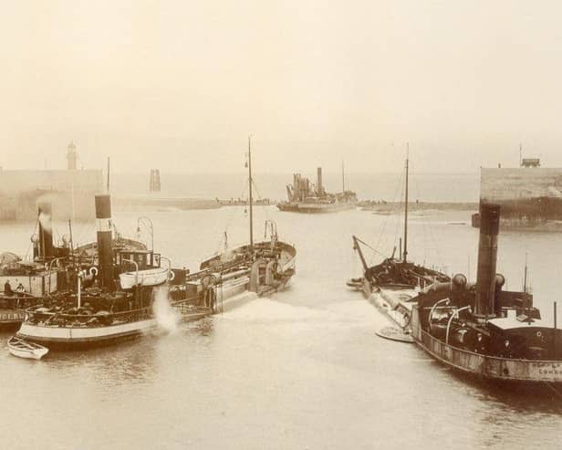Dredgers opening the mouth of Heysham Harbour, 1904. Photo courtesy of Heysham Port Ltd.