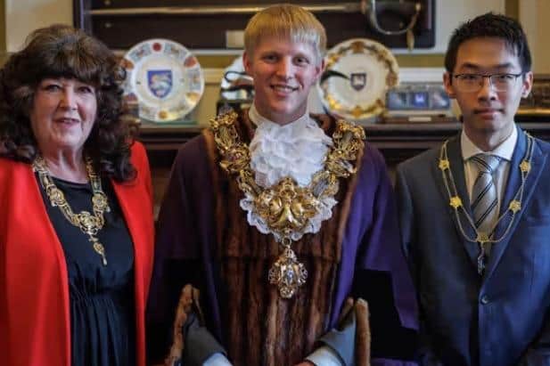 Coun Darby at his mayoral installation with his Mayoress Coun Pauline Brown and Mayor's Consort Dan Leung (Image: Michael Porter Photography).