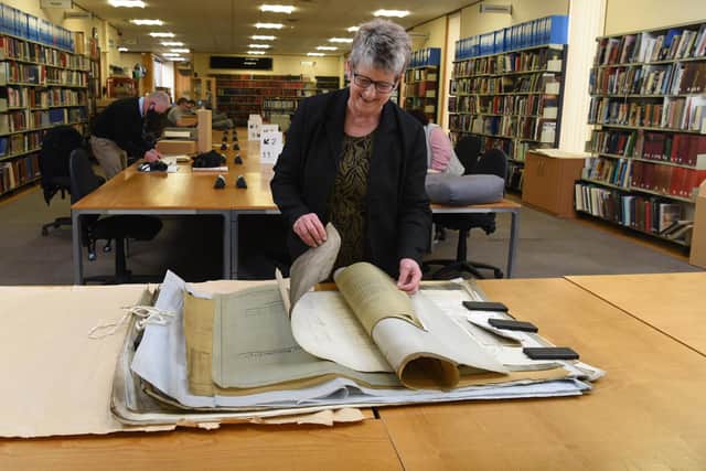 A job she loves - Jacquie Crosby exploring records at the Lancashire Archives  Photo: Neil Cross