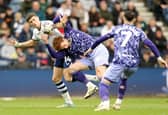 Preston North End's Jordan Storey battles for possession with Norwich City's Josh Sargent