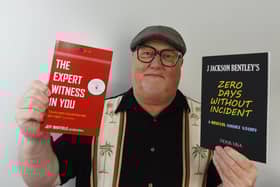 Chorley author Jeffrey Whitfield, who goes by the name of J Jackson Bentley when writing fiction, with some of his published books