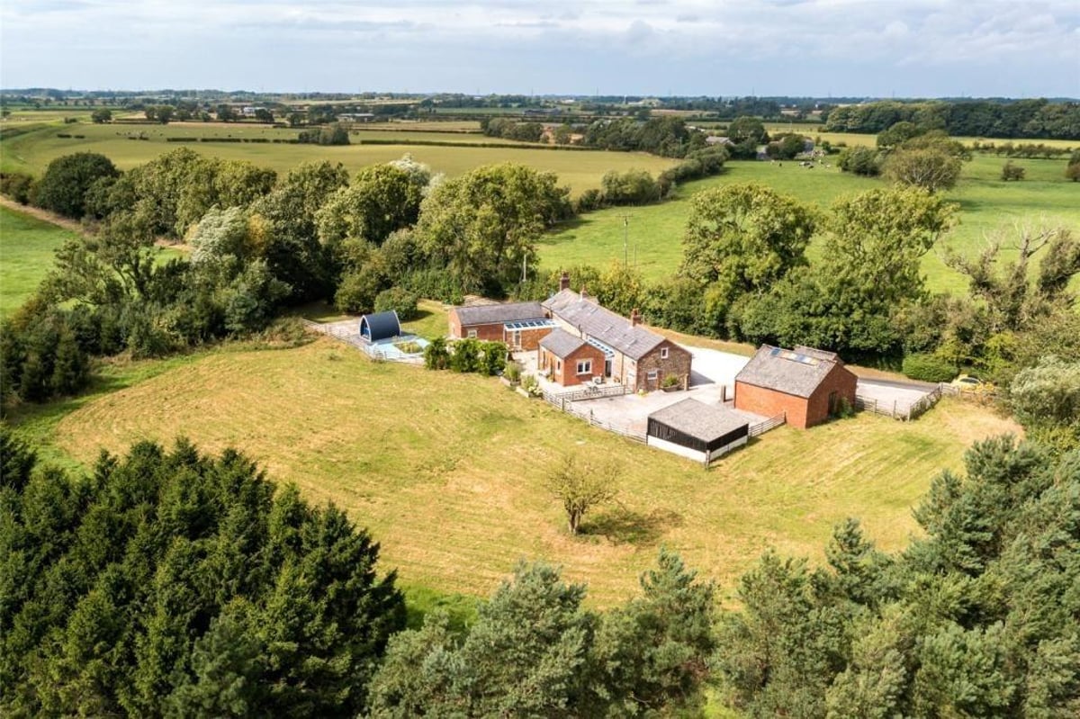Riverside Lancashire farmhouse with amazing interior design on the market for £650k