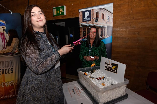 Jodie Mitchell and Sarah Salisbury from Safe and Insured hook a truck at Lancashire Business Expo 2022. Photo: Kelvin Stuttard