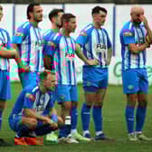 Players look on anxiously during the penalty shootout which Lancaster lost to City of Liverpool in the FA Trophy  Photo: JOSHUA BRANDWOOD
