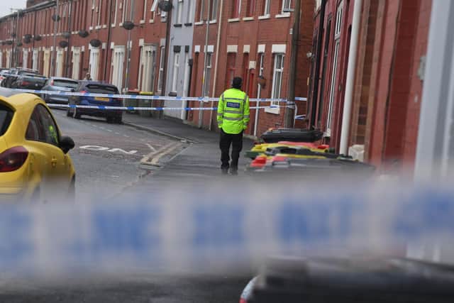 Shelley Road in Ashton has been taped off since around 9am, between Roebuck Street and Eldon Street, while emergency services work at the scene. Picture by Neil Cross / Lancashire Post