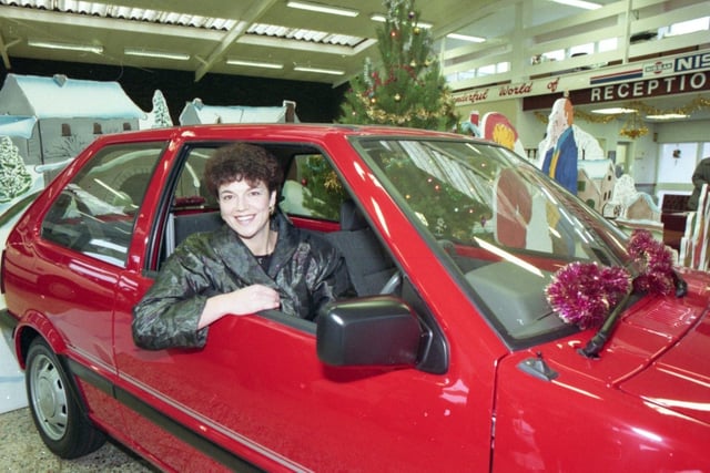 Housewife Jackie Hudson was getting in gear for an extra special Christmas celebration. Mrs Hudson, 34, of York Drive, Great Eccleston, near Preston, is the winner of The Evening Post Win A Car For Christmas competition. She drove off with an £8,000 shiny red Nissan Micra, donated by sponsors Fred Coupe Limited, of Walton-le-Dale